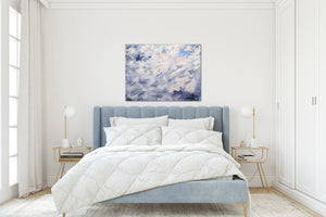 Modern luxurious bedroom mockup showcasing purple abstract painting by Dana Mooney on canvas above headboard. 