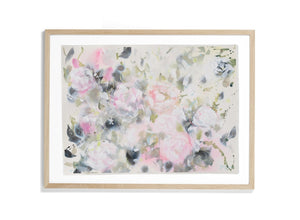 A framed mixed media abstract floral painting on watercolour paper. Soft saje greens and greys blend behind textural pink and coral flower petals. Splashes of paint and scribbles of pastel give this painting a modern feel.